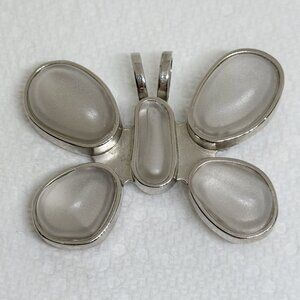 Rebecca Collins pendant or clip, made for Neiman Marcus in 2000